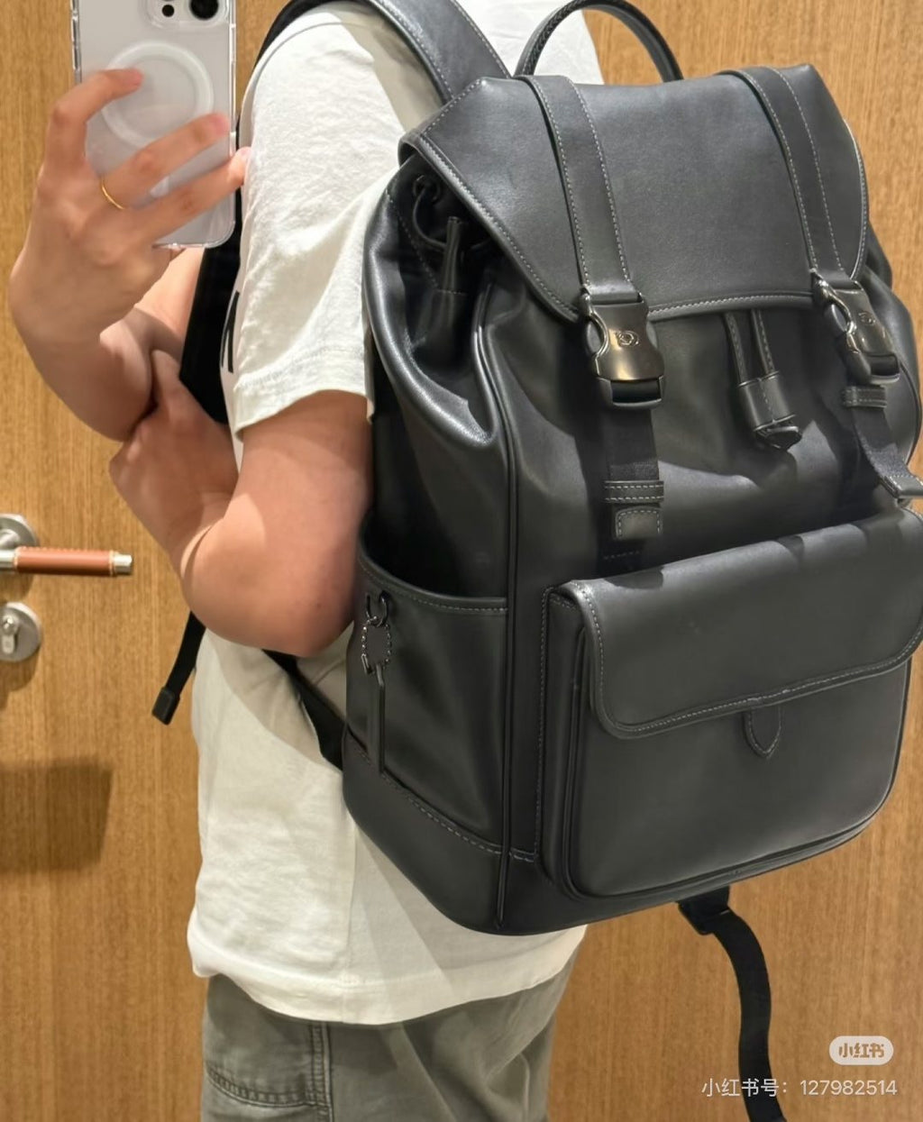 Coach Twin-Buckle Drawstring Backpack — model