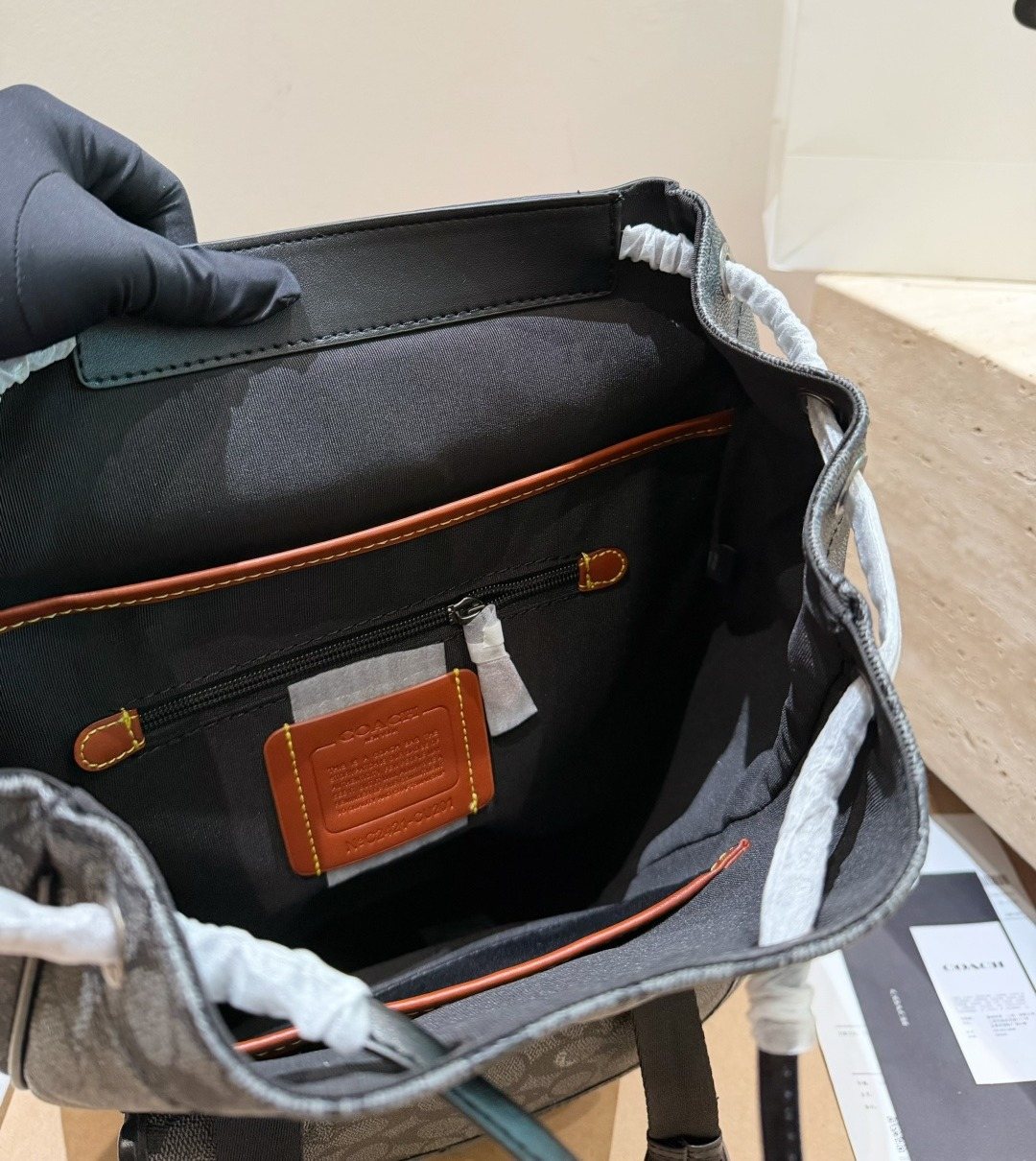Coach Twin-Buckle Drawstring Backpack — detail