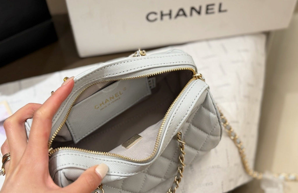 Chanel Quilted Bowling Bag with Jeweled CC Emblem — detail