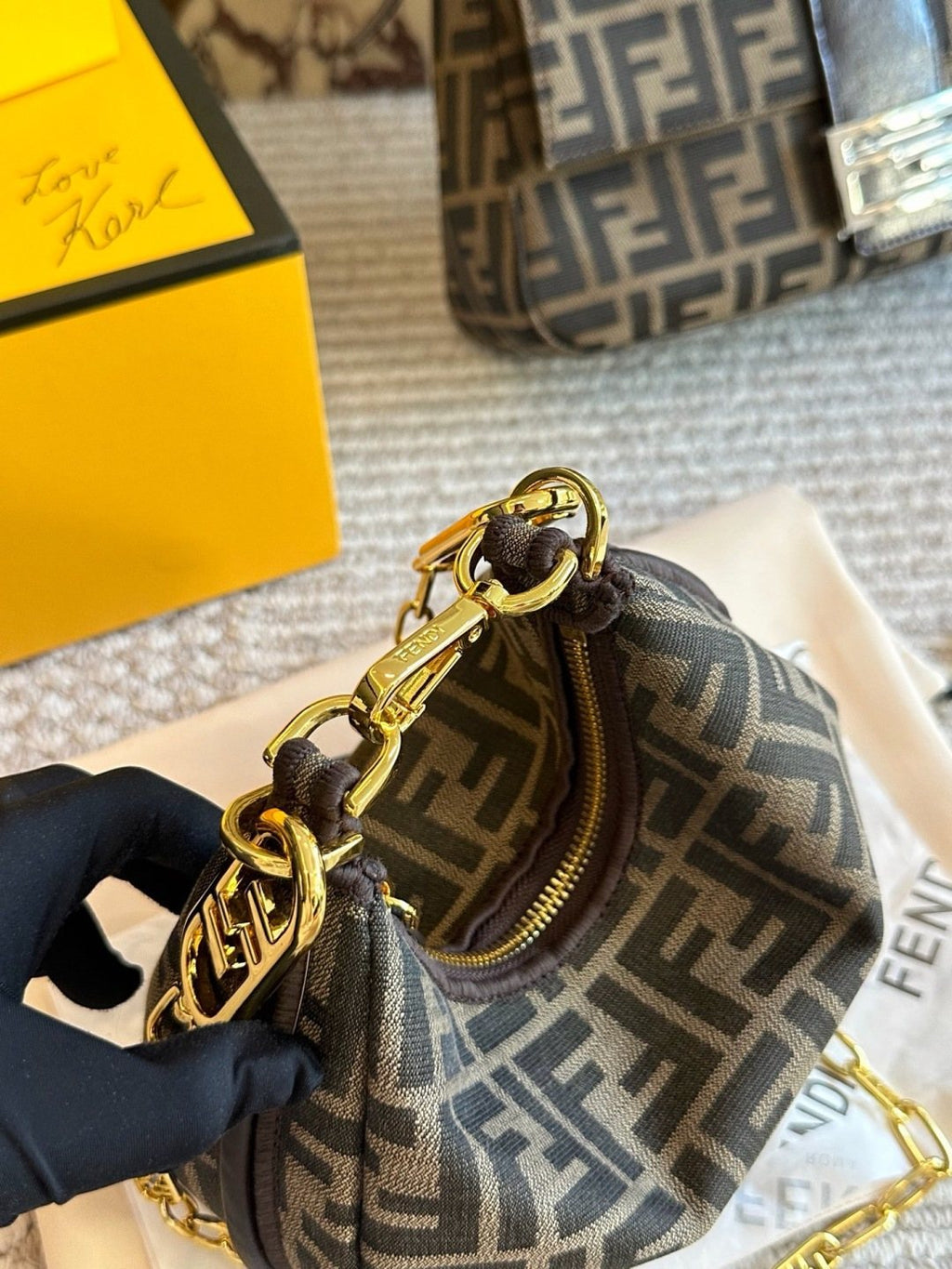 Fendi FF-Pattern Crescent Handbag — front