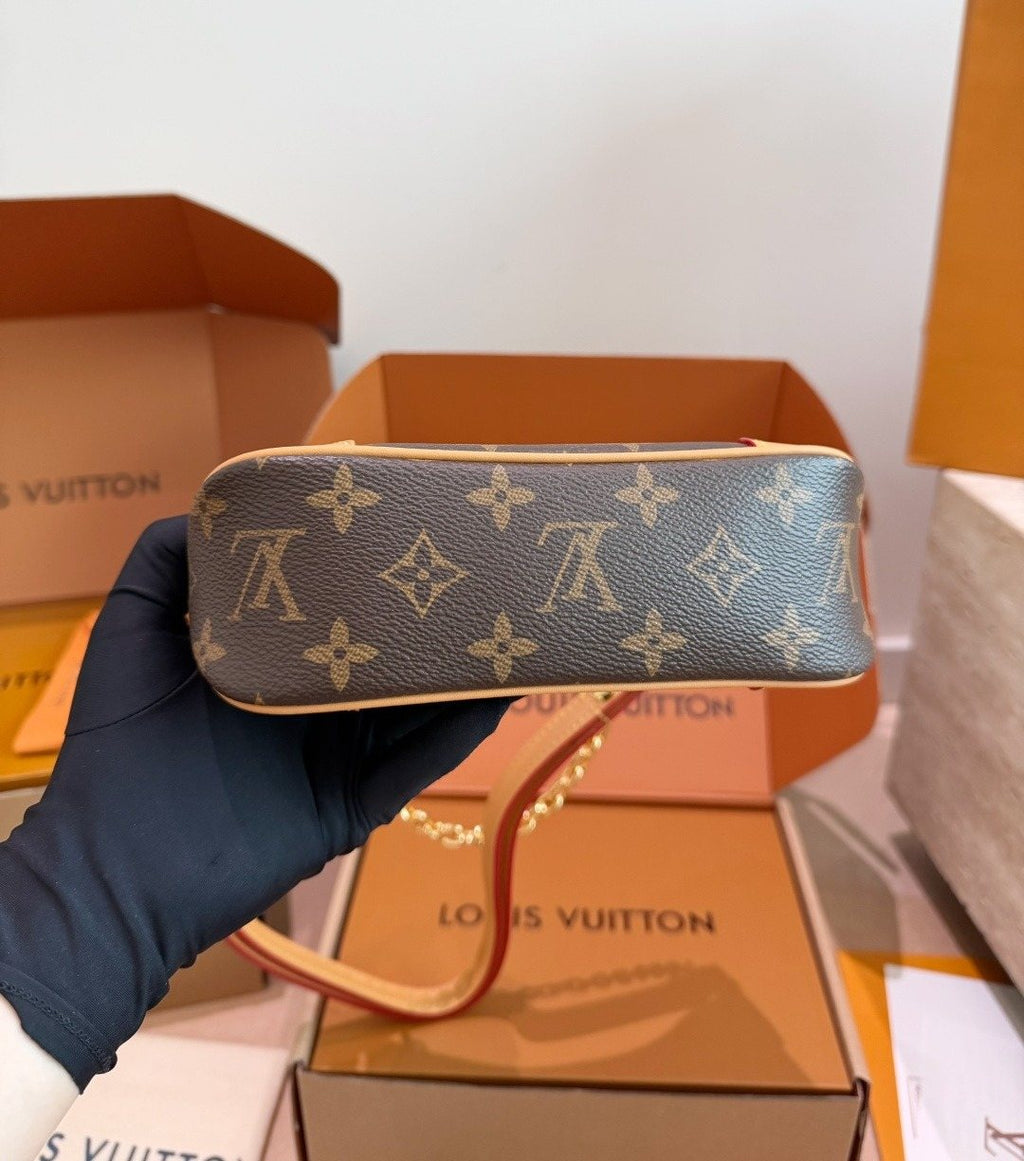 Louis Vuitton Curved Monogram Chain Crossbody Bag — detail
