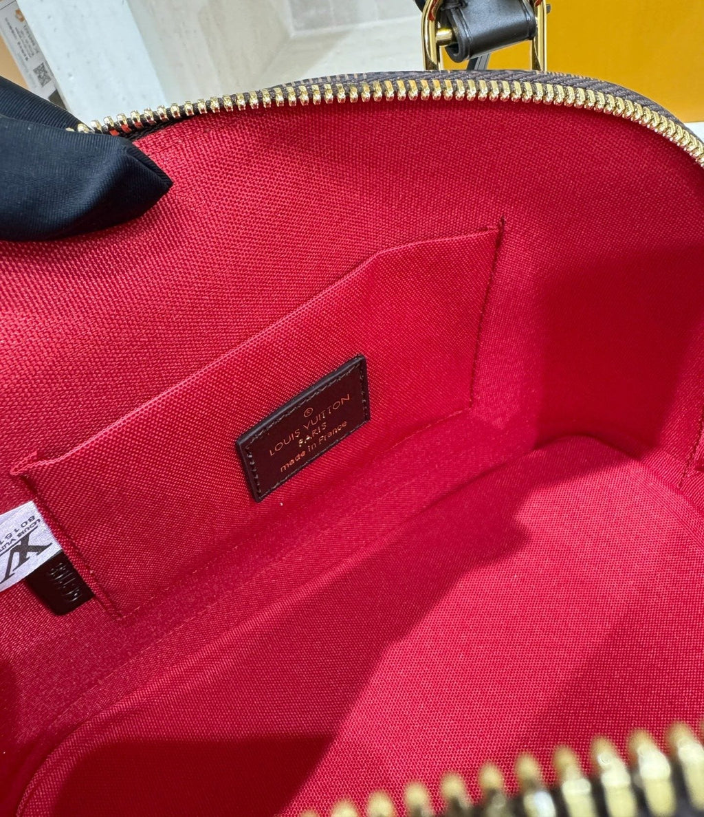 Louis Vuitton Domed Top-Handle Bag — detail