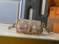 Louis Vuitton Favorite Monogram Empreinte Shoulder Bag — hero