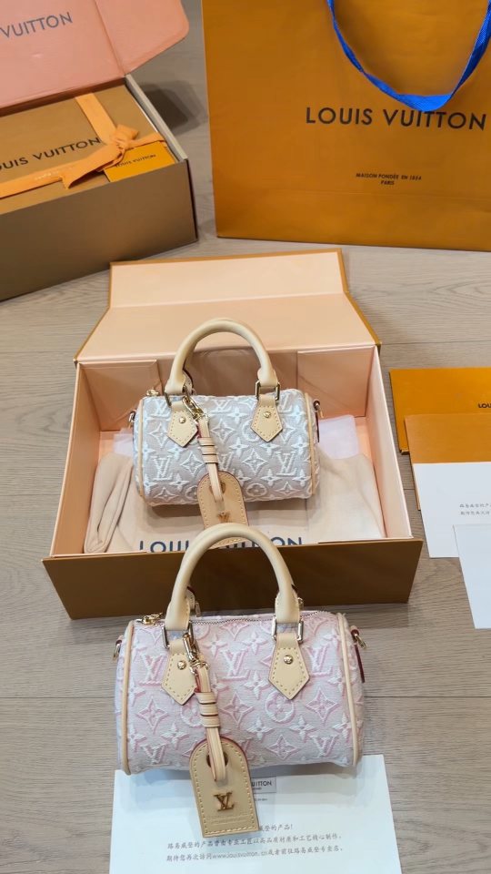 Louis Vuitton Speedy Bandoulière Monogram Empreinte Barrel Bag — comparison