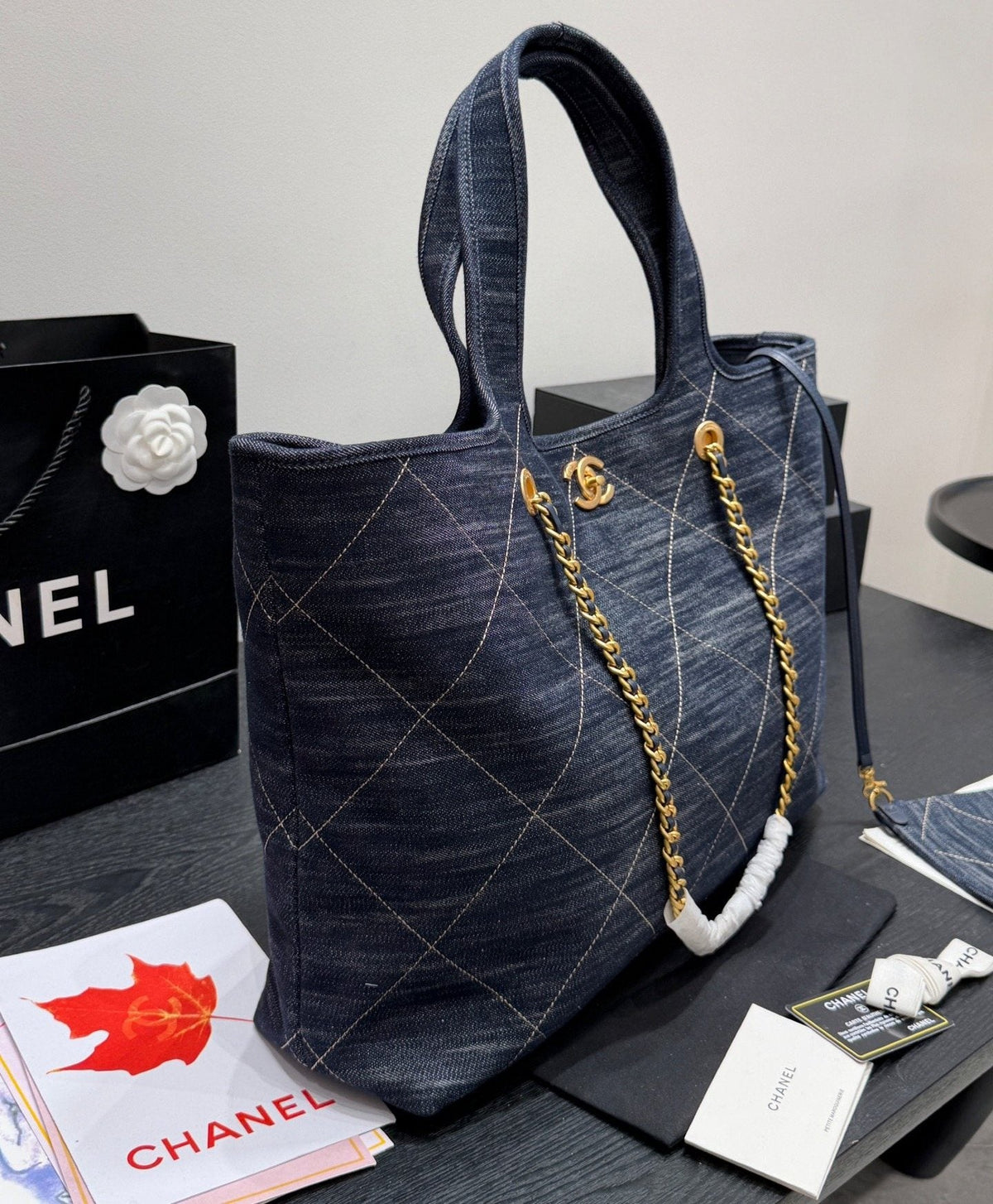 Chanel Quilted Denim Tote with Gold-Tone Chains — side