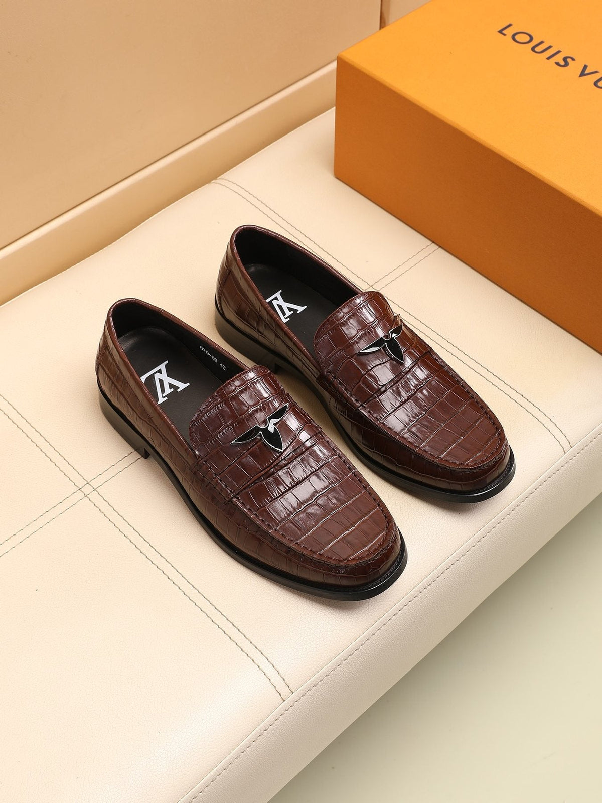 Louis Vuitton Embossed Strap Loafers — front