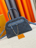 Louis Vuitton Ever More Blue Monogram Handbag — hero