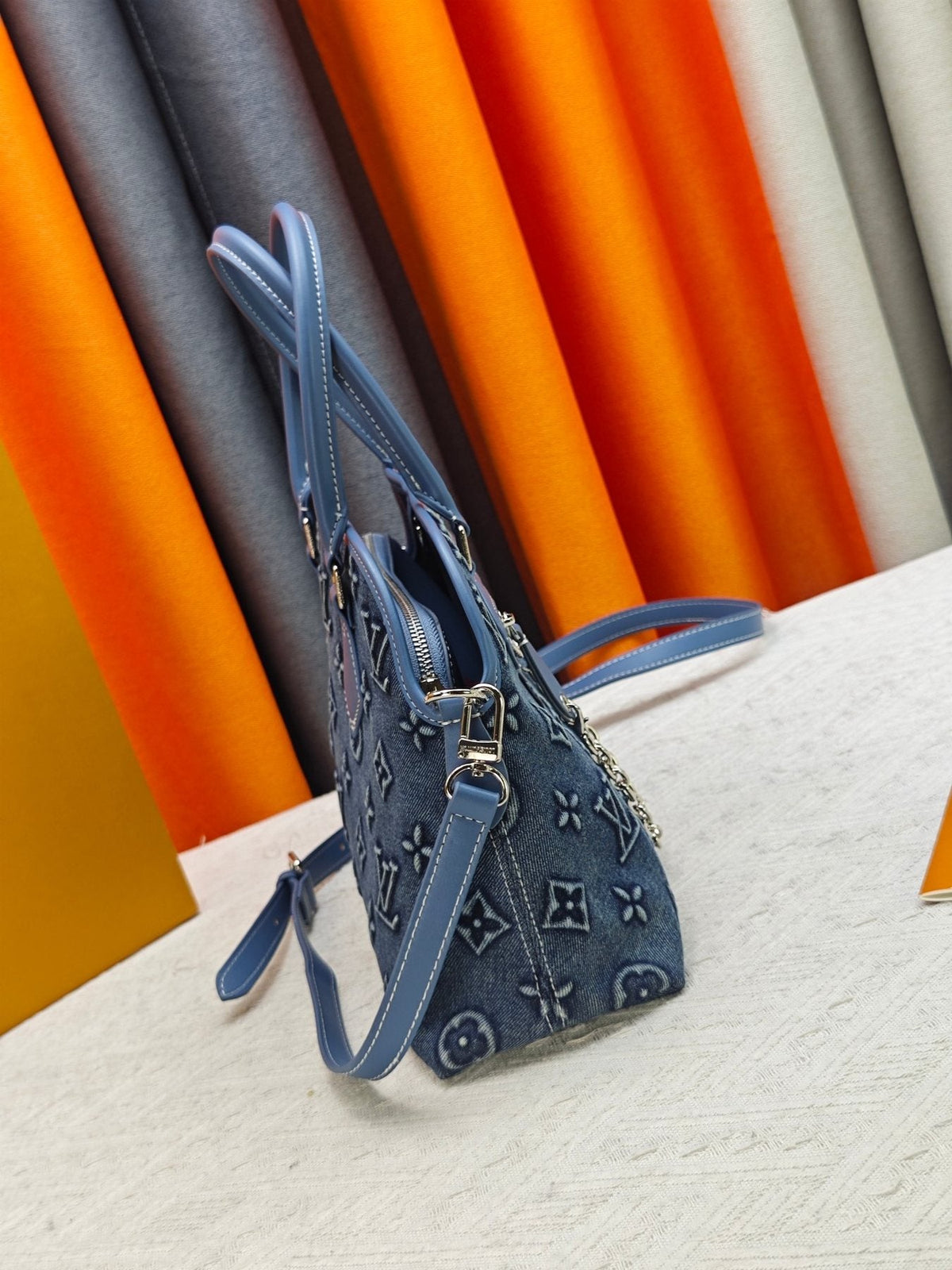 Louis Vuitton Ever More Blue Monogram Handbag — side