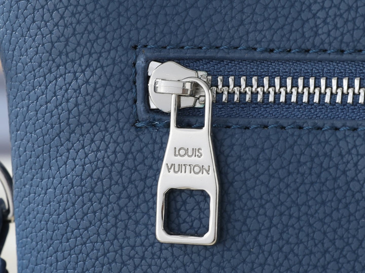 Louis Vuitton Takeoff Leather Wristlet Clutch — detail