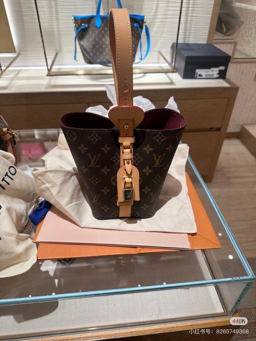 Louis Vuitton Monogram Buckle-Strap Bucket Bag — hero
