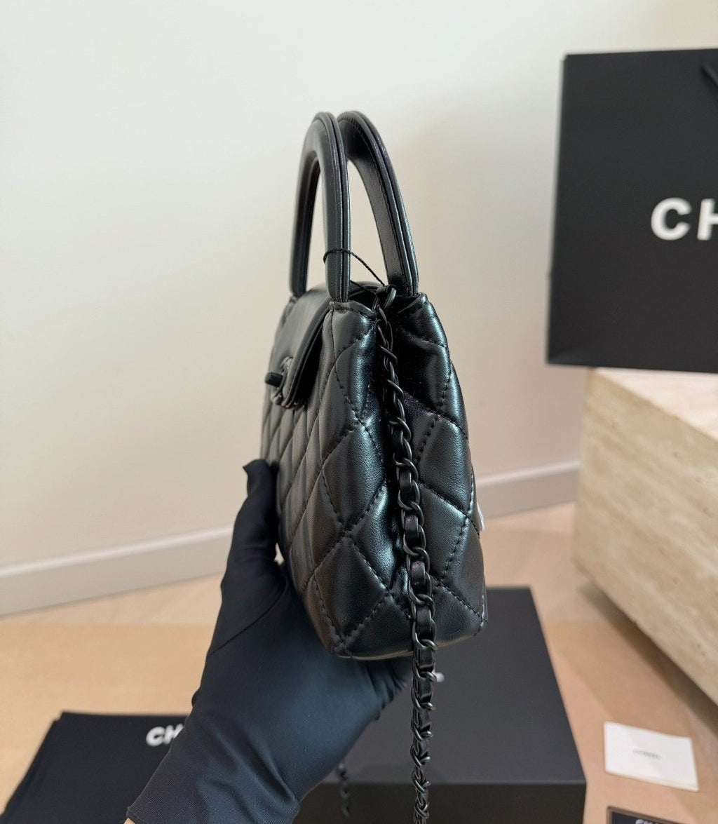 Chanel Kelly Quilted Top-Handle Bag — side