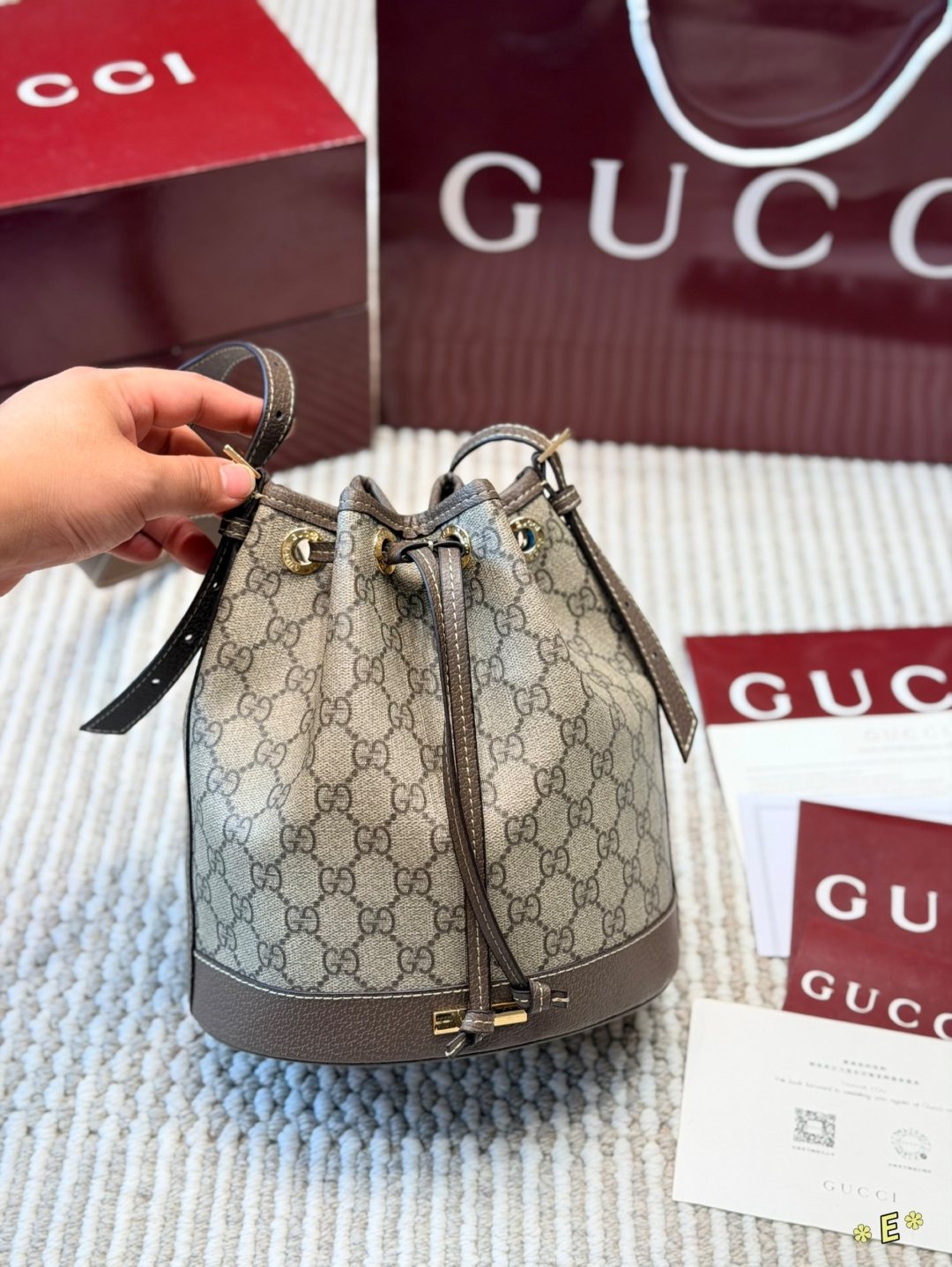 Gucci Monogram Drawstring Bucket Bag — hero